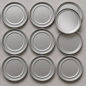 Tapas metálicas para envases de alimentos en diámetros 300, 401, 502 y 603 milímetros.