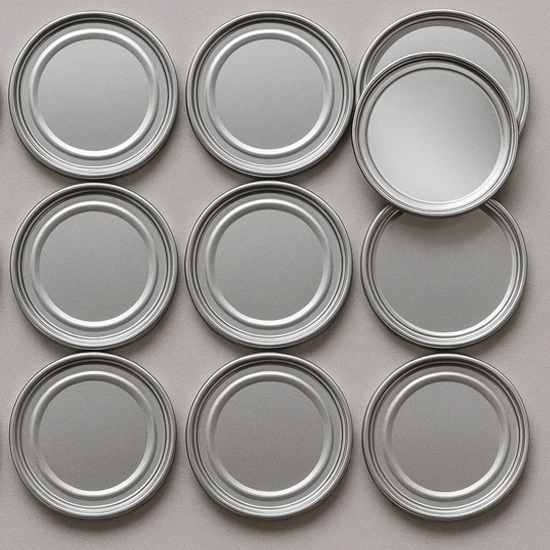 Tapas metálicas para envases de alimentos en diámetros 300, 401, 502 y 603 milímetros.